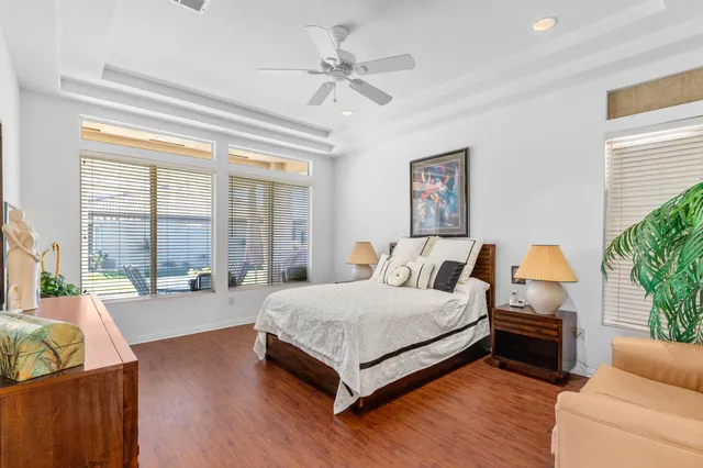 a bed room with a bed and a dresser