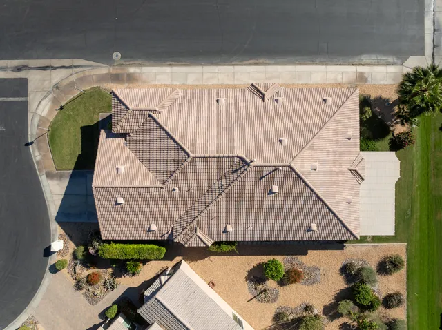 a view of a swimming pool with a table and chairs