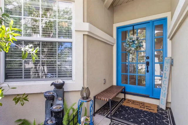 a room with furniture a window and a chandelier