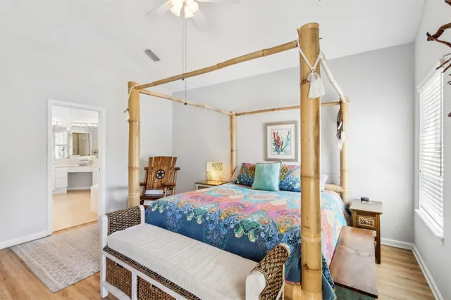 a view of a livingroom with furniture and windows