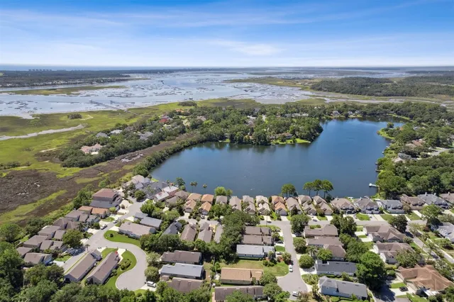 a view of a balcony with trees