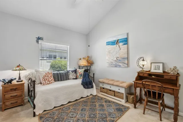 a view of room with furniture and large window