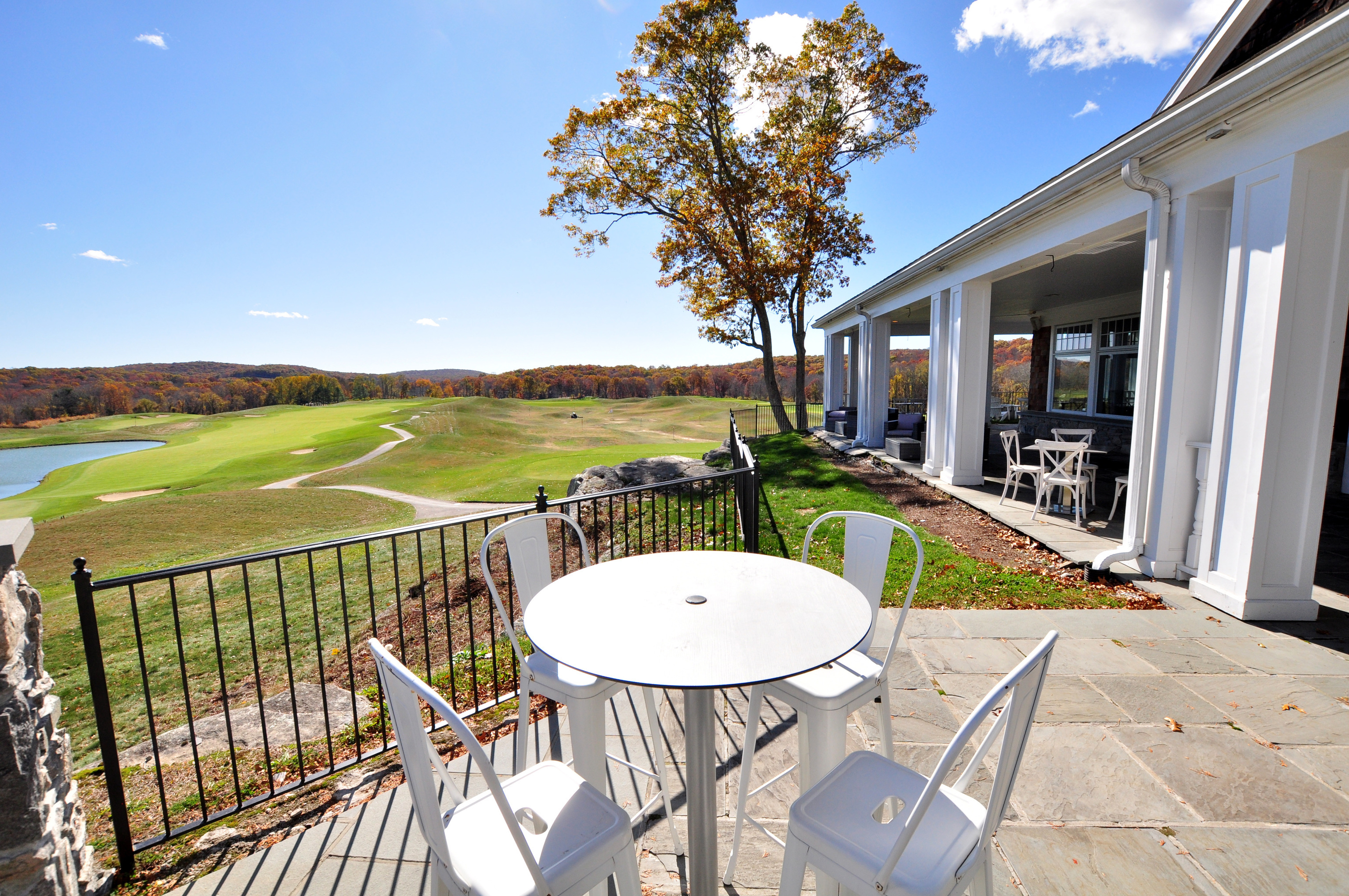708 Fox Hopyard Road East Haddam, CT 06423 - Photo 28 of 31 a view of a balcony with a table and chairs