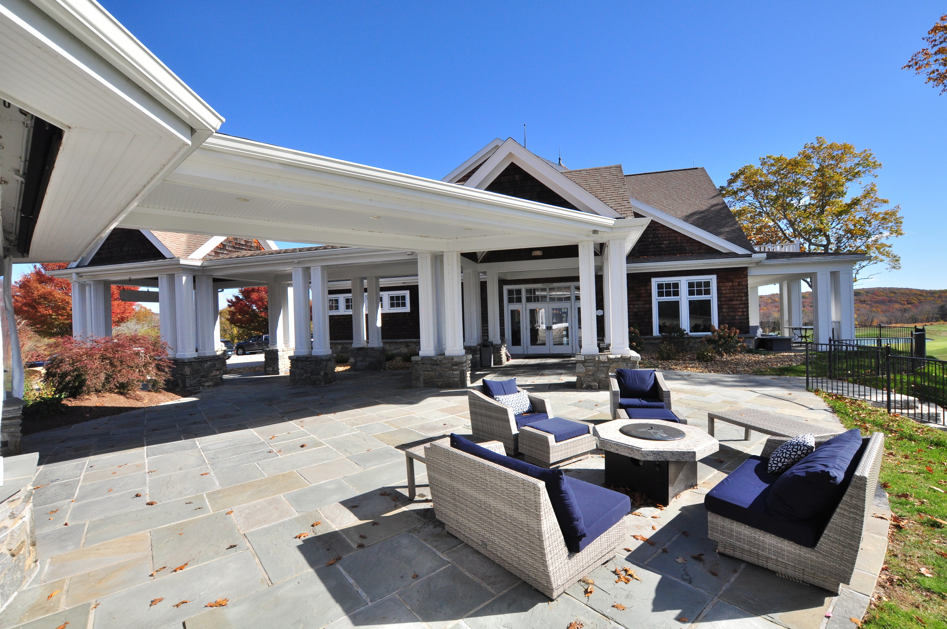 708 Fox Hopyard Road East Haddam, CT 06423 - Photo 30 of 31 a view of a patio with couches table and chairs and potted plants