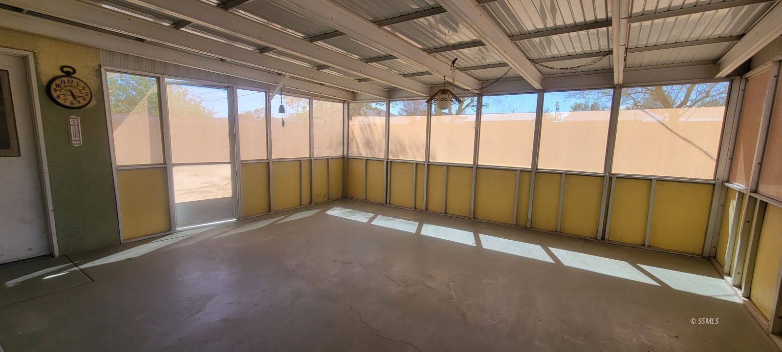 405 Karin Street Ridgecrest, CA 93555 - Photo 16 of 21 a view of an empty room with a window
