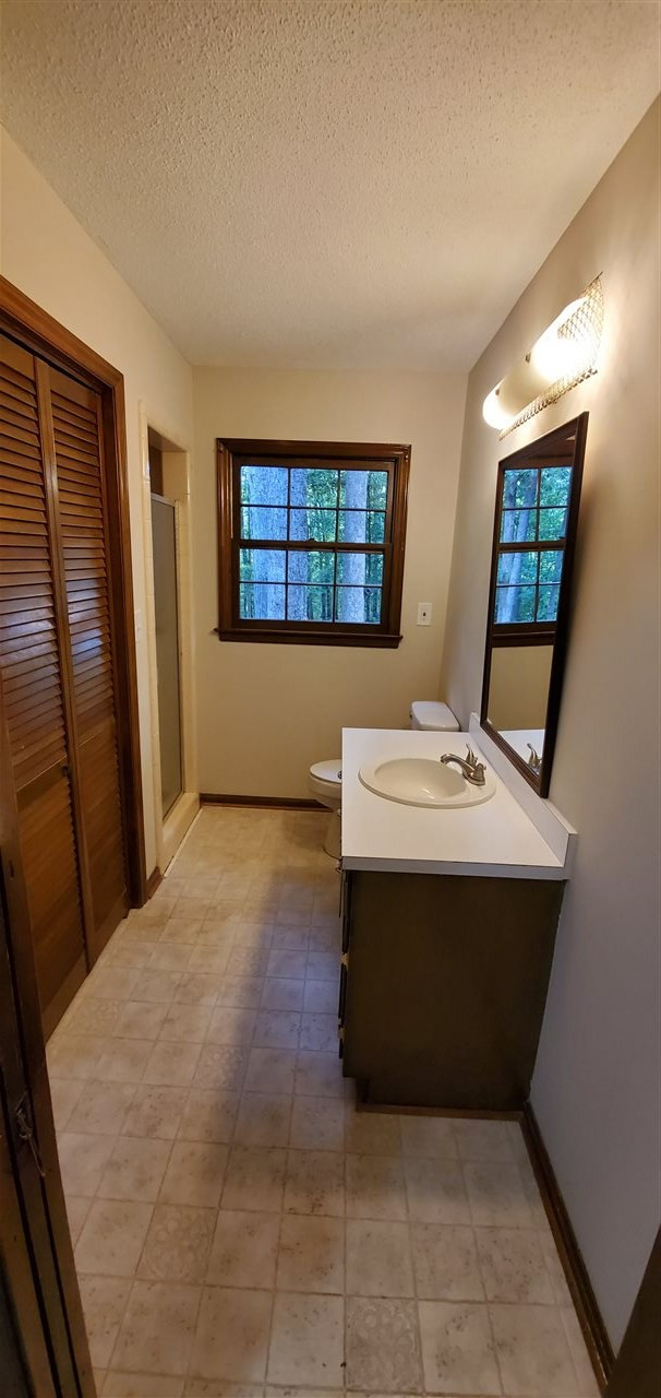 4012 Oak Park Road Raleigh, NC 27612 - Photo 17 of 17 Downstairs Bathroom and Laundry
