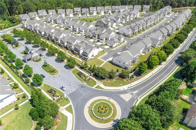 a view of a swimming pool with a garden
