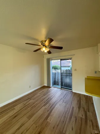 a view of residential kitchen with wooden floor