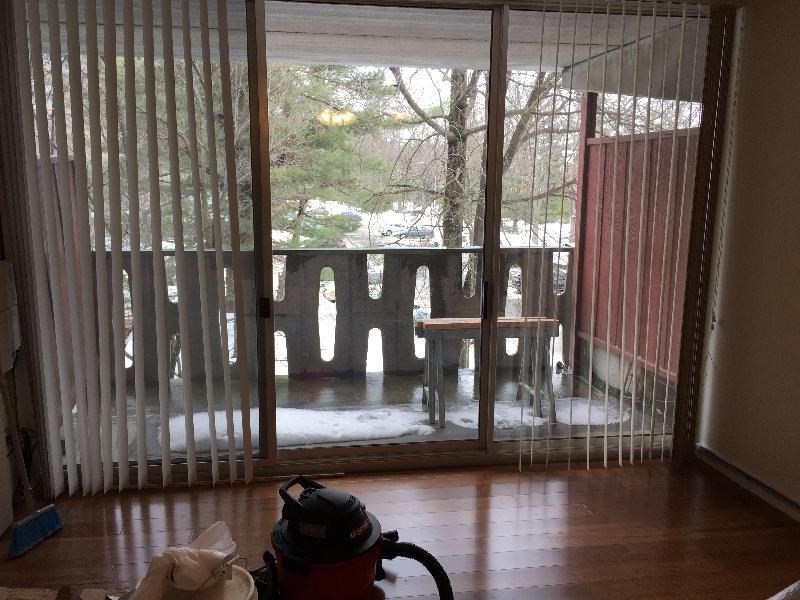 200 Swanton Street, Unit 238 Winchester, MA 01890 - Photo 5 of 7 a living room filled with furniture and a table