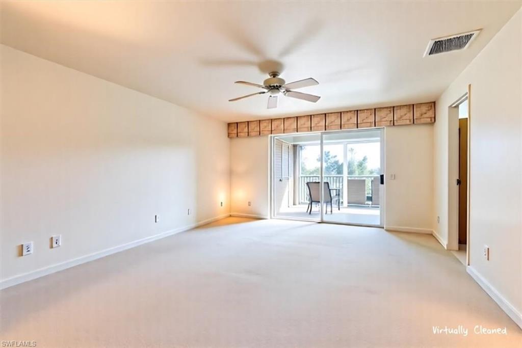5515 Rattlesnake Hamm Road, Unit 301 Naples, FL 34113 - Photo 16 of 30 a view of an empty room with a window