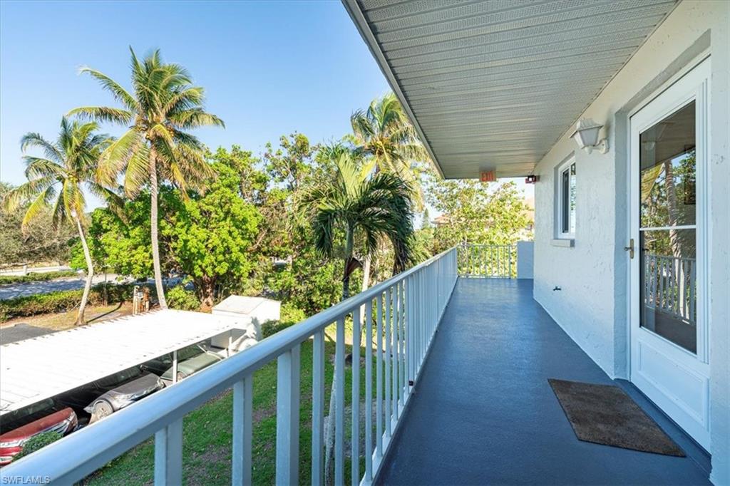 5515 Rattlesnake Hamm Road, Unit 301 Naples, FL 34113 - Photo 17 of 30 a view of a balcony