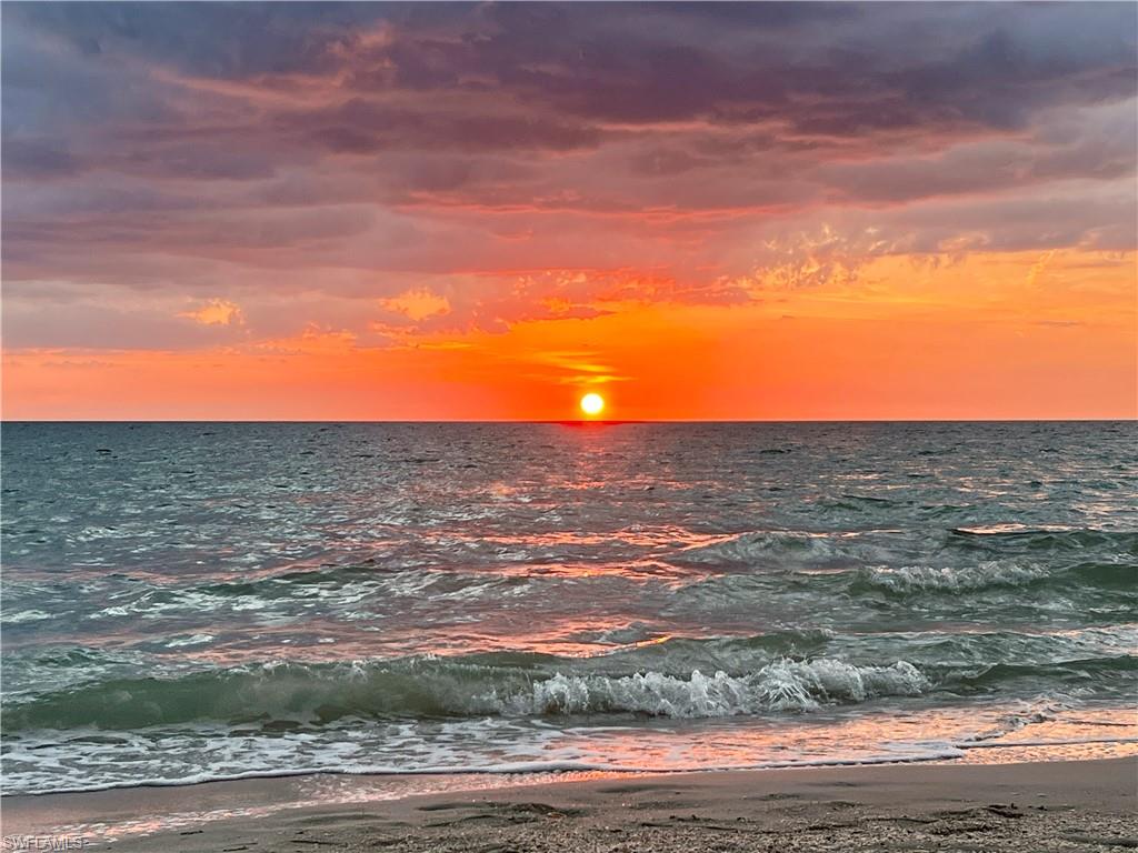 5515 Rattlesnake Hamm Road, Unit 301 Naples, FL 34113 - Photo 30 of 30 a view of a sky from a beach