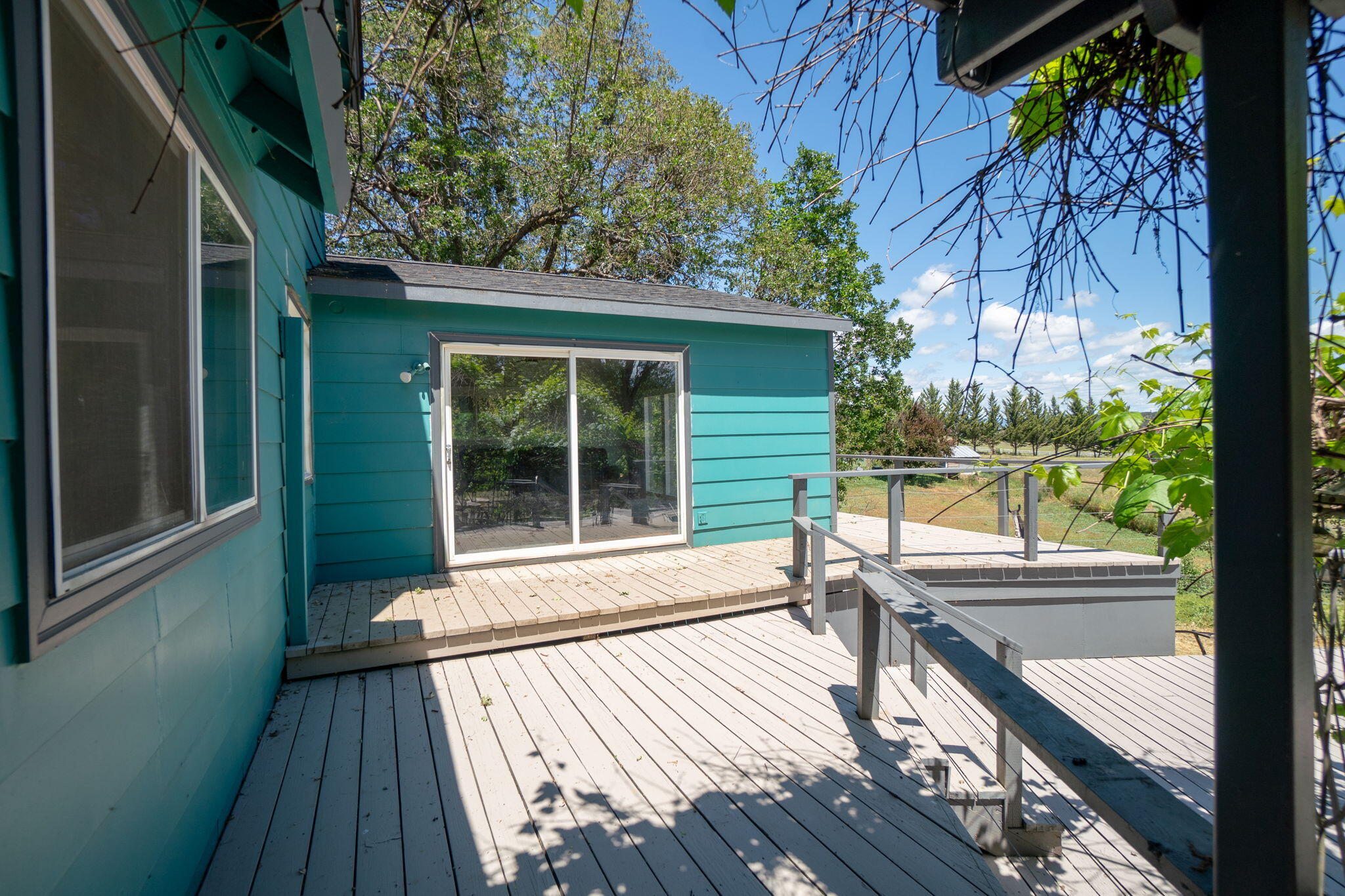 4970 Old Stage Road Central Point, OR 97502 - Photo 30 of 43 a view of balcony with wooden floor and outdoor space