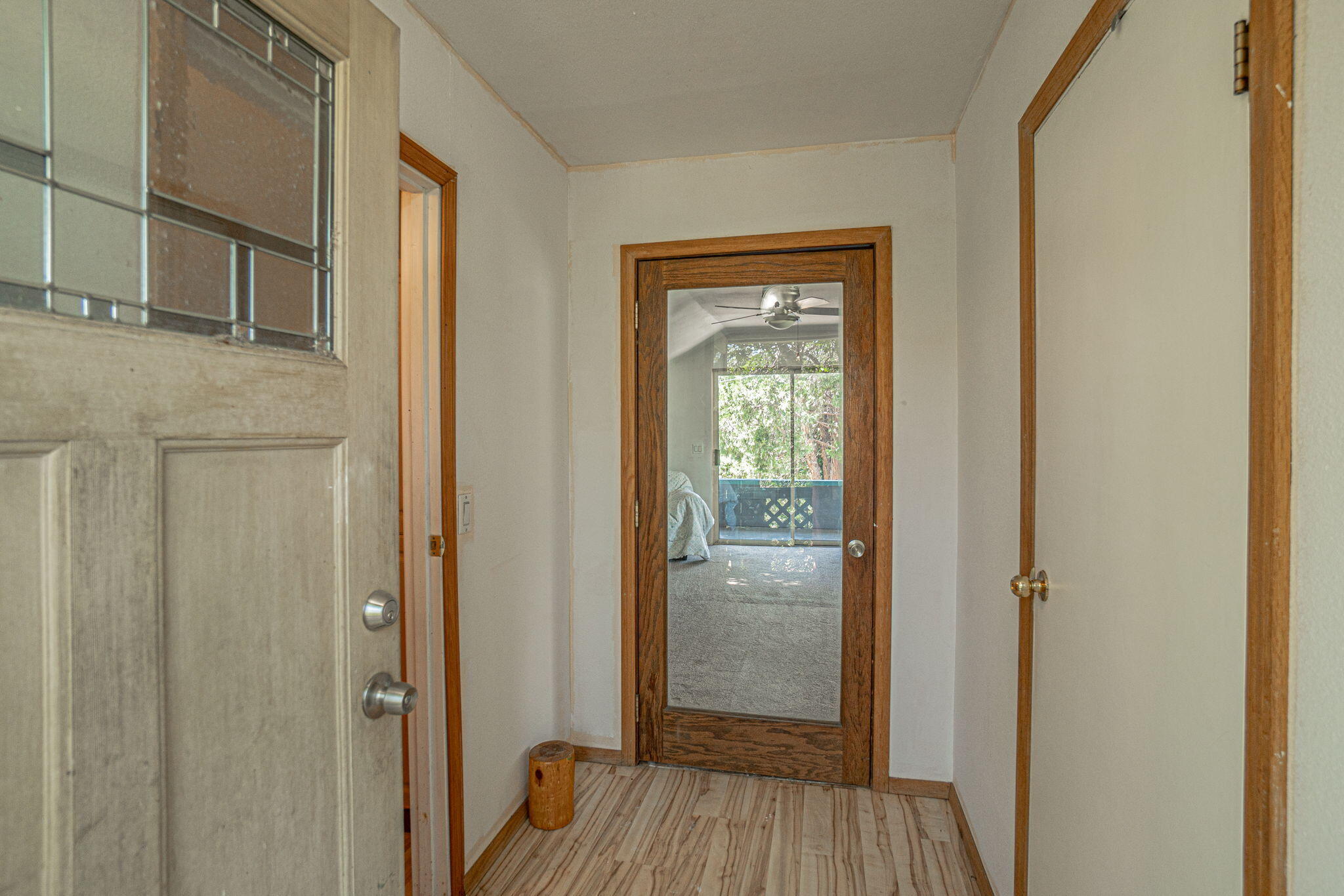 4970 Old Stage Road Central Point, OR 97502 - Photo 36 of 43 a view of a hallway with wooden floor