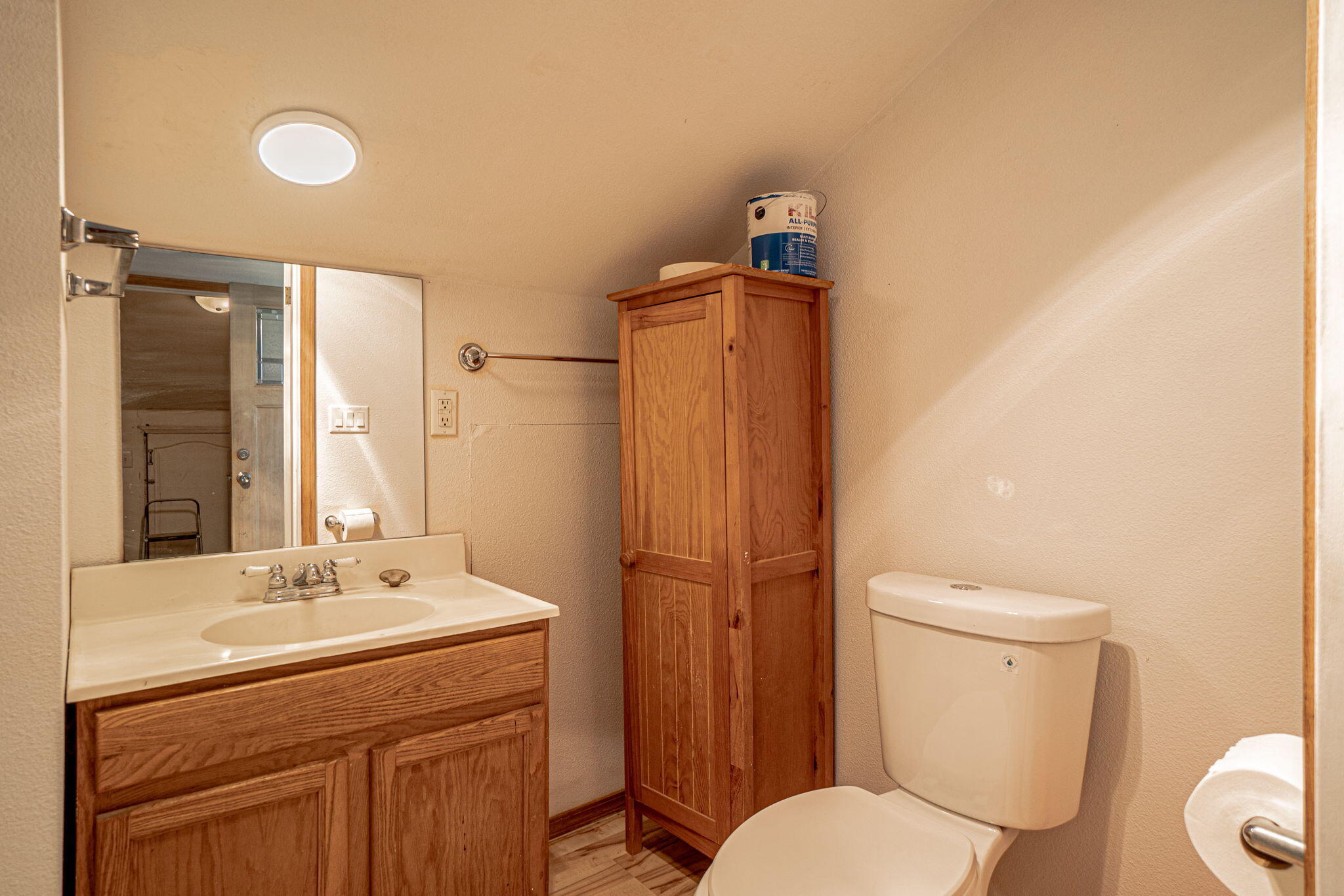 4970 Old Stage Road Central Point, OR 97502 - Photo 37 of 43 a bathroom with a granite countertop toilet sink and mirror