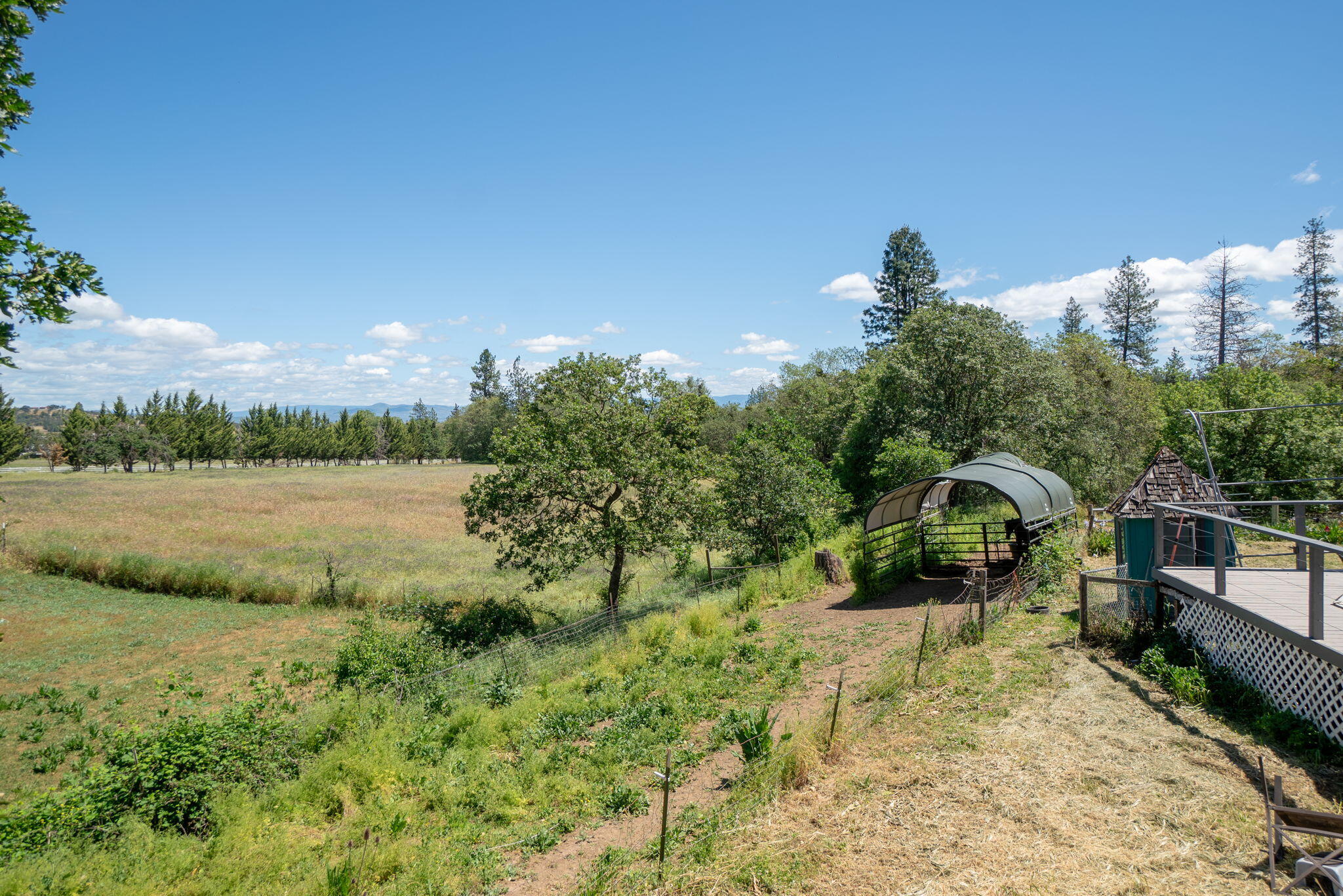 4970 Old Stage Road Central Point, OR 97502 - Photo 42 of 43 a view of a lake with a yard