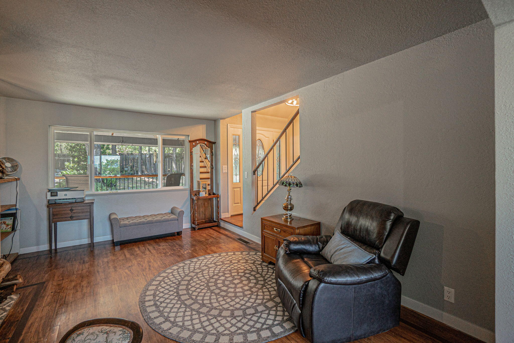 4970 Old Stage Road Central Point, OR 97502 - Photo 7 of 43 a living room with furniture rug and wooden floor