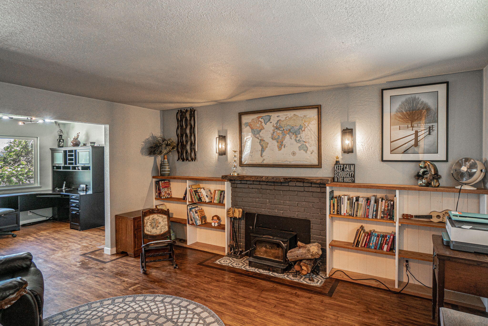 4970 Old Stage Road Central Point, OR 97502 - Photo 8 of 43 a living room with furniture and a fireplace