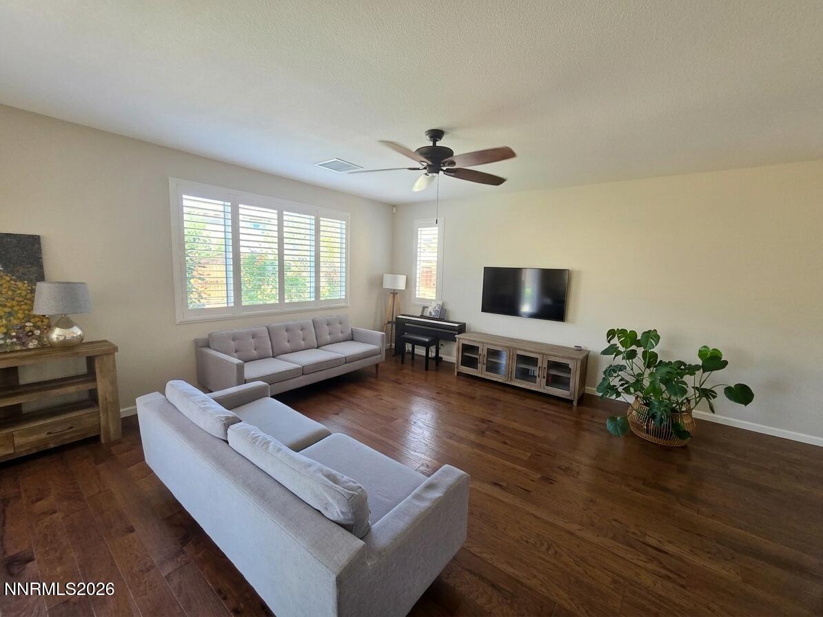 2775 Bonfire Lane Reno, NV 89521 - Photo 10 of 41 a living room with furniture and a flat screen tv