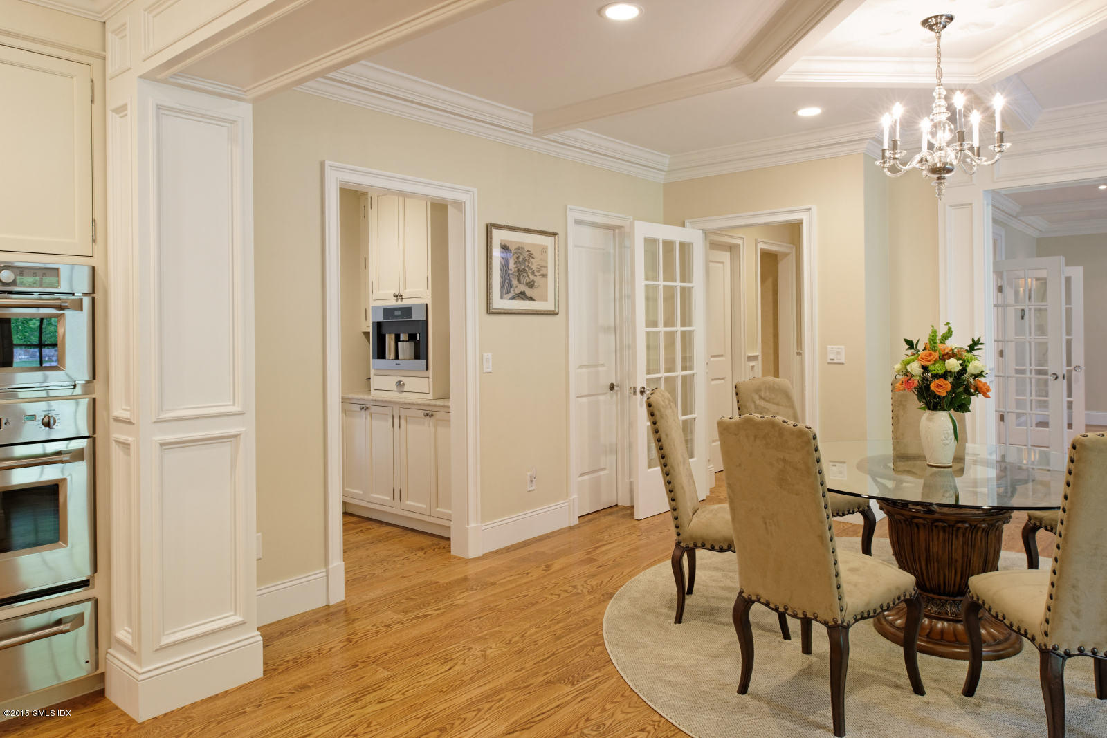 25 Cutler Road Greenwich, CT 06831 - Photo 5 of 40 a view of a dining room with furniture and wooden floor