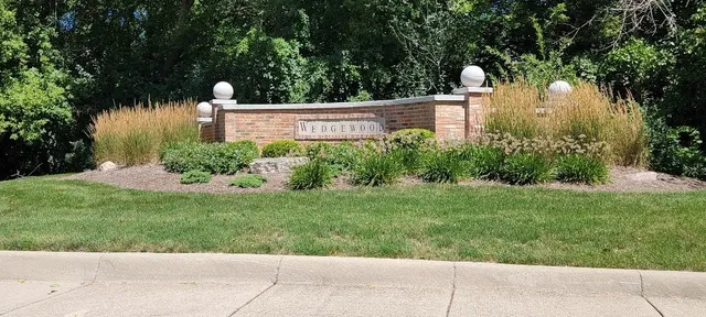 a view of statue in a garden