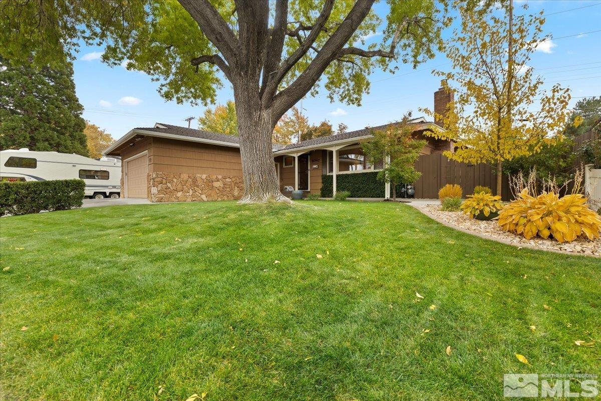 1420 Elizabeth Street Reno, NV 89509 - Photo 1 of 23 a view of a house with a yard