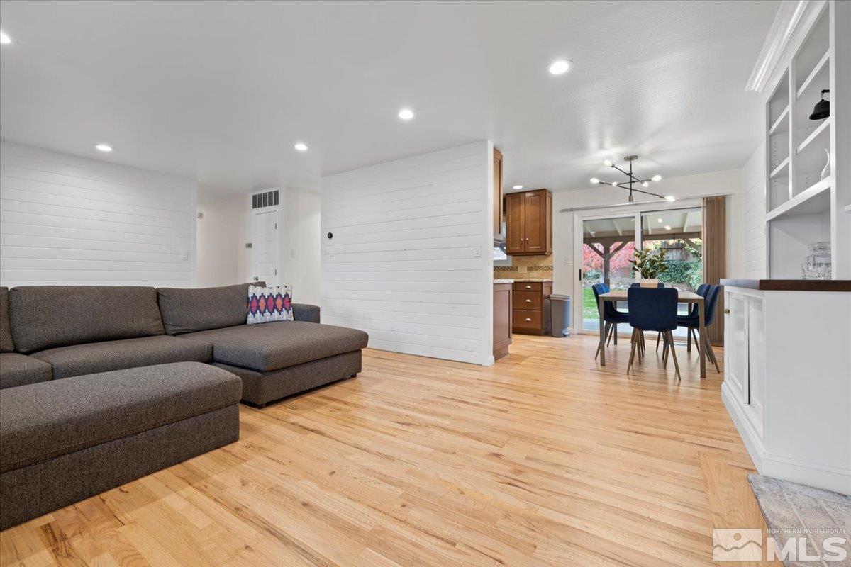 1420 Elizabeth Street Reno, NV 89509 - Photo 7 of 23 a living room with furniture and a wooden floor