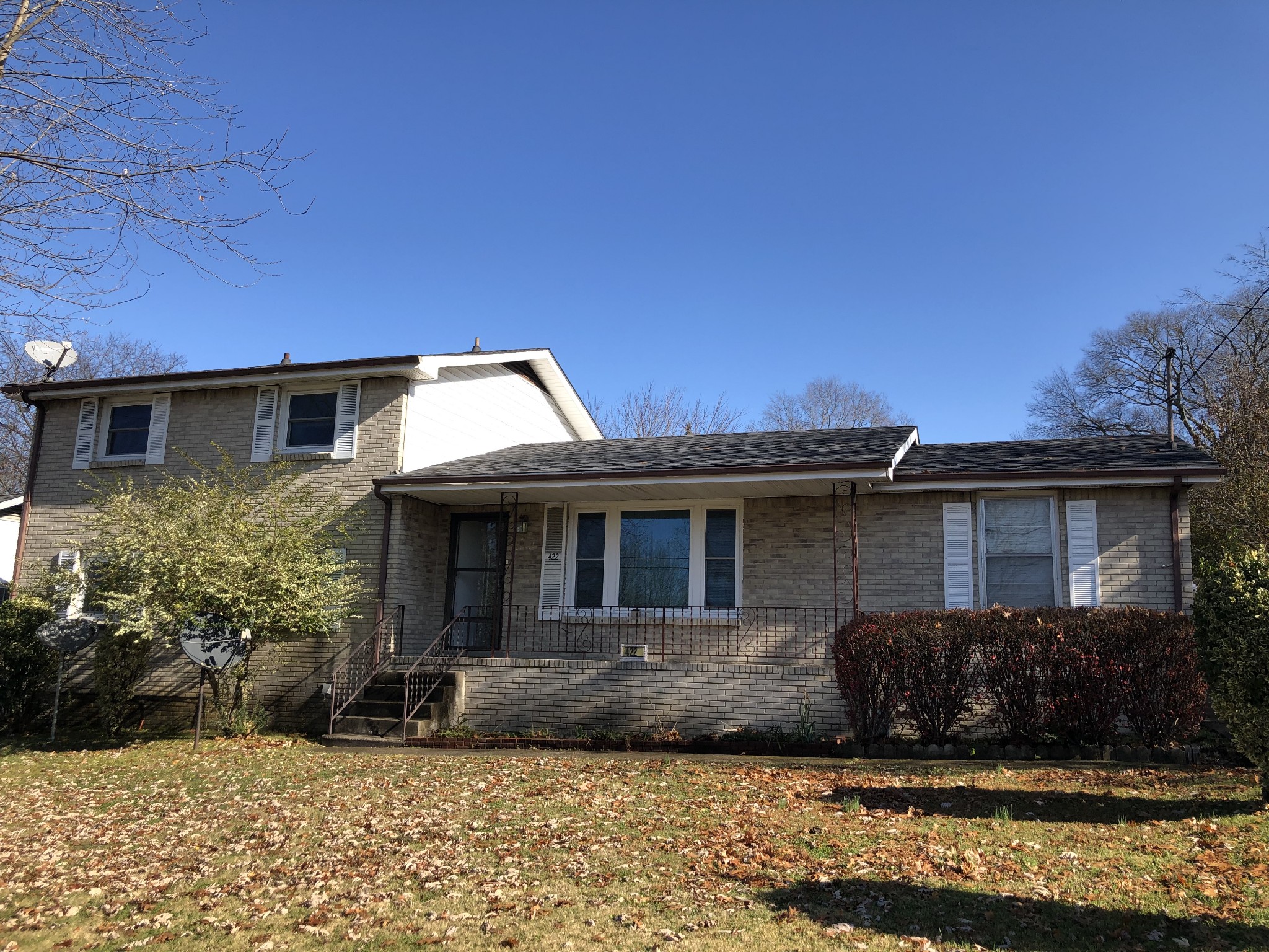 422 Cedarcliff Road Antioch, TN 37013 - Photo 1 of 26 a front view of a house with a garden