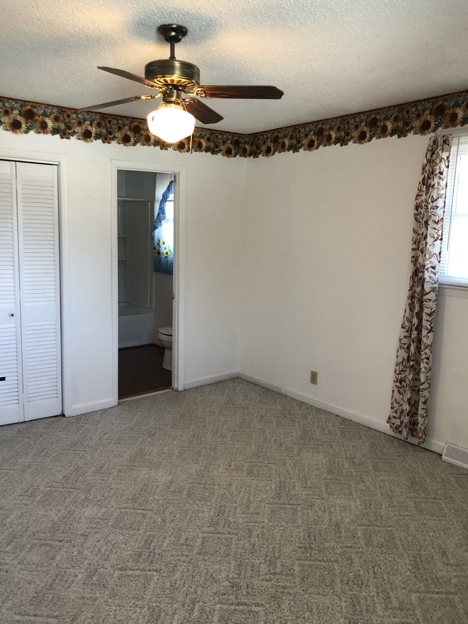 422 Cedarcliff Road Antioch, TN 37013 - Photo 12 of 26 a view of a room with a hanging light and kitchen view