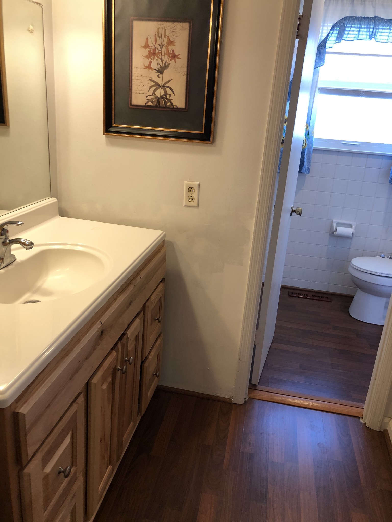 422 Cedarcliff Road Antioch, TN 37013 - Photo 13 of 26 a bathroom with a granite countertop sink and a toilet