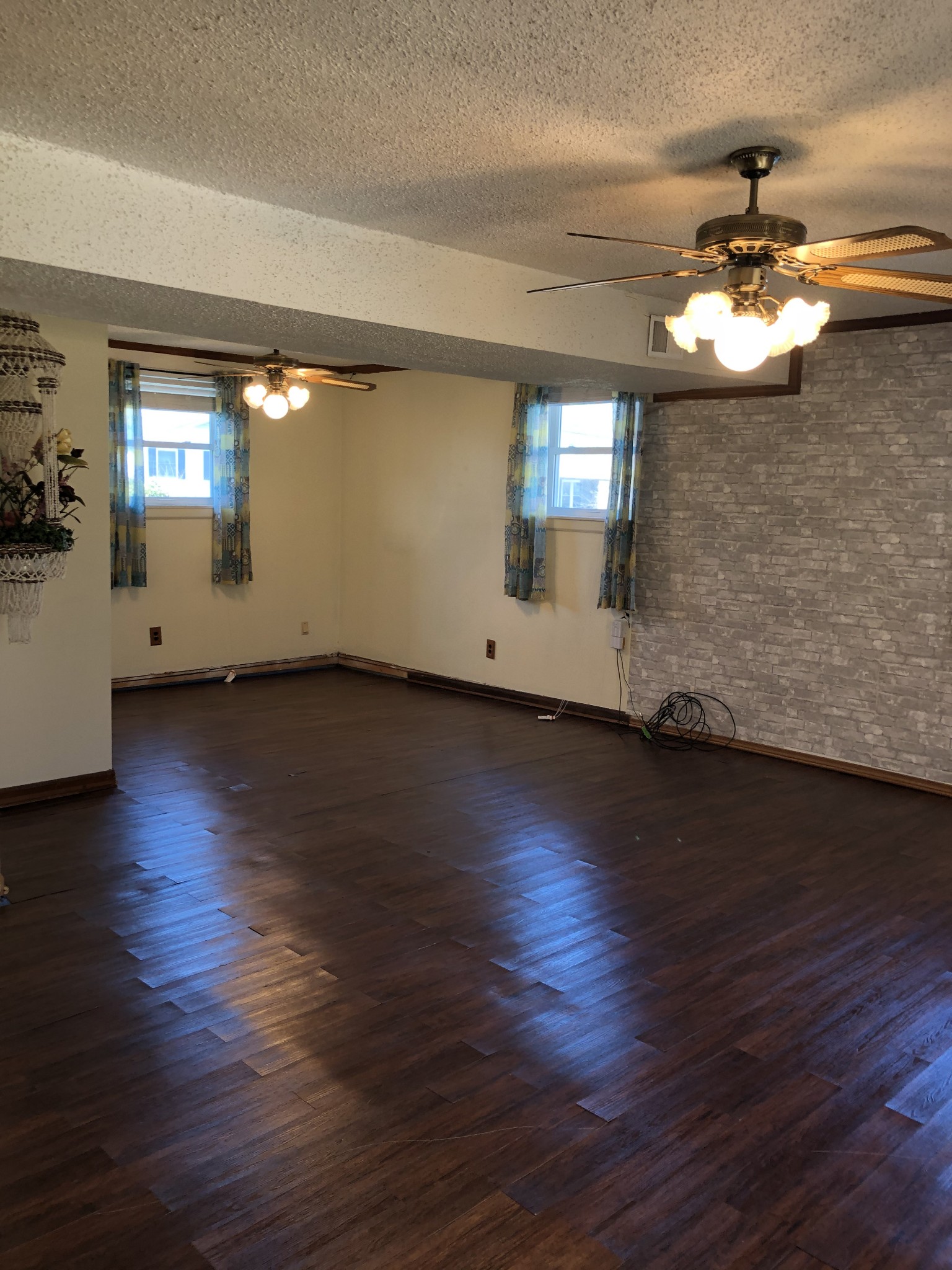 422 Cedarcliff Road Antioch, TN 37013 - Photo 18 of 26 a view of an empty room with wooden floor and a window