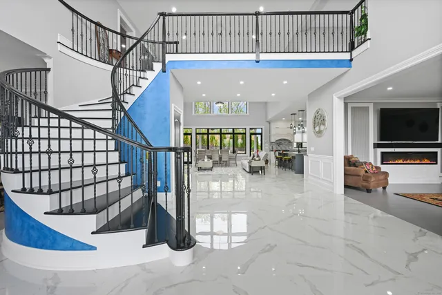 a view of entryway wih livingroom and hall