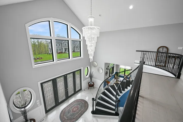 a view of a balcony with furniture