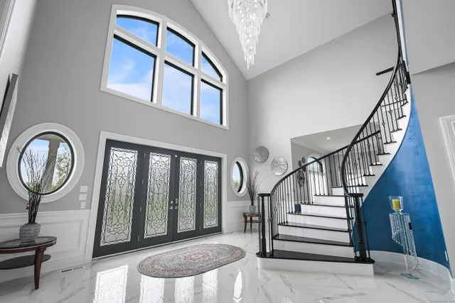 a view of an entryway with a front door