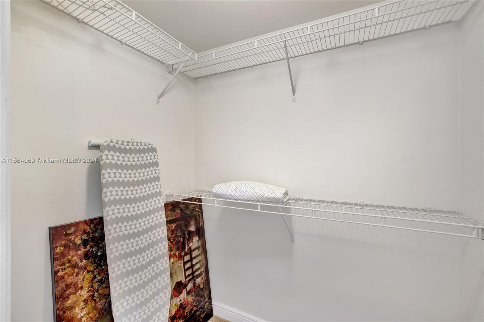 17150 North Bay Road, Unit 2216 Sunny Isles Beach, FL 33160 - Photo 25 of 46 a close view of walk in closet