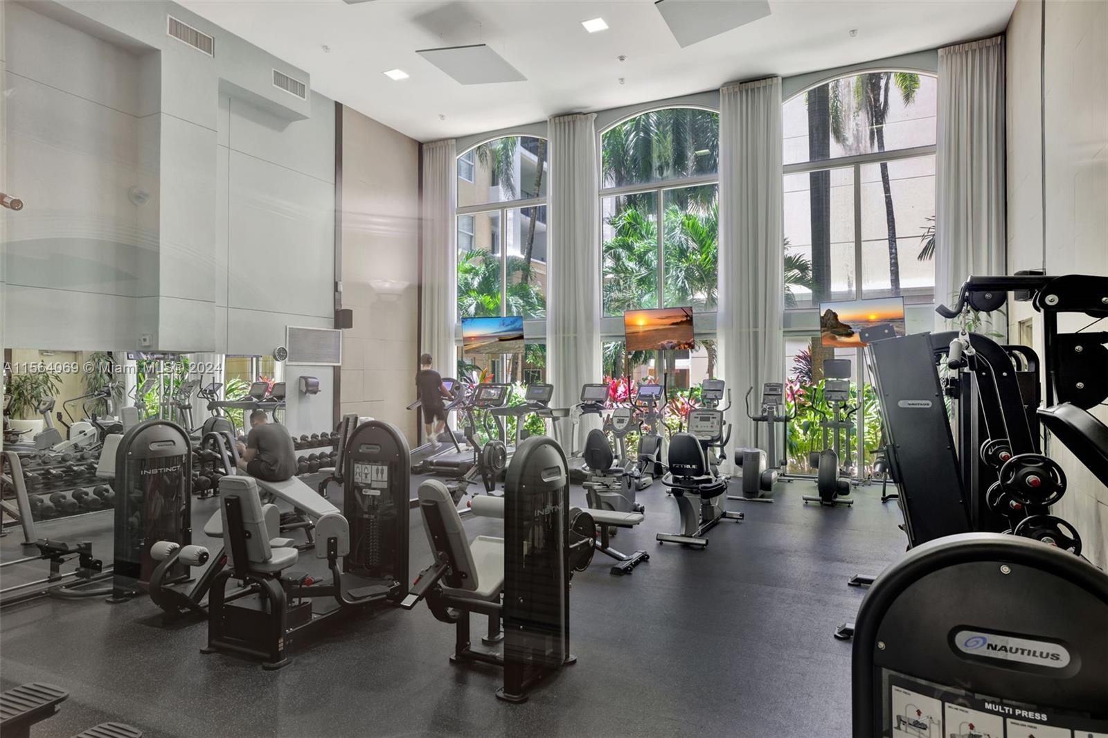 17150 North Bay Road, Unit 2216 Sunny Isles Beach, FL 33160 - Photo 40 of 46 a view of a room with gym equipment