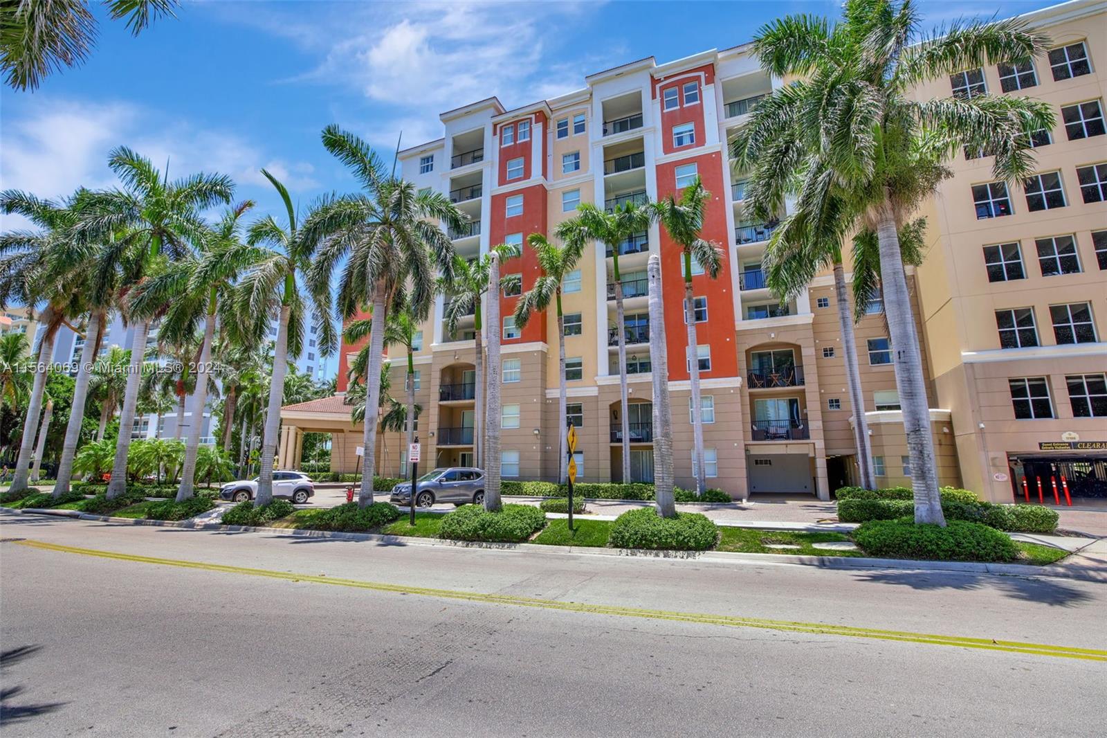 17150 North Bay Road, Unit 2216 Sunny Isles Beach, FL 33160 - Photo 41 of 46 front view of multiple houses with a yard