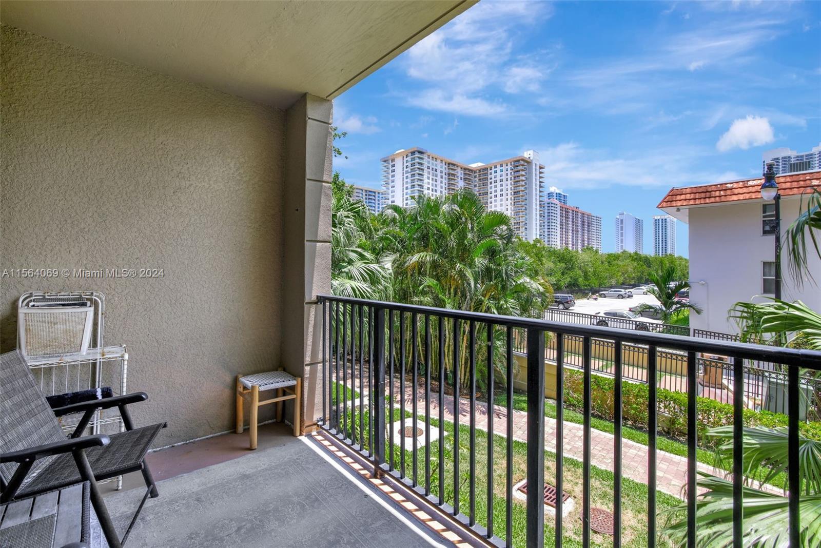 17150 North Bay Road, Unit 2216 Sunny Isles Beach, FL 33160 - Photo 7 of 46 a view of a city from a balcony