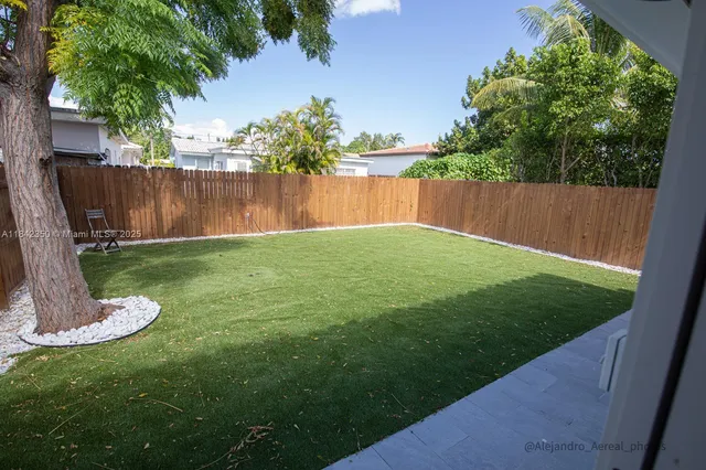 a view of a backyard with a garden