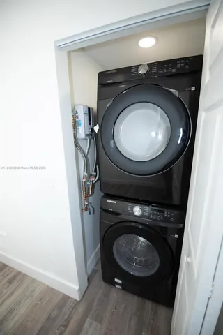 a utility room with dryer and washer