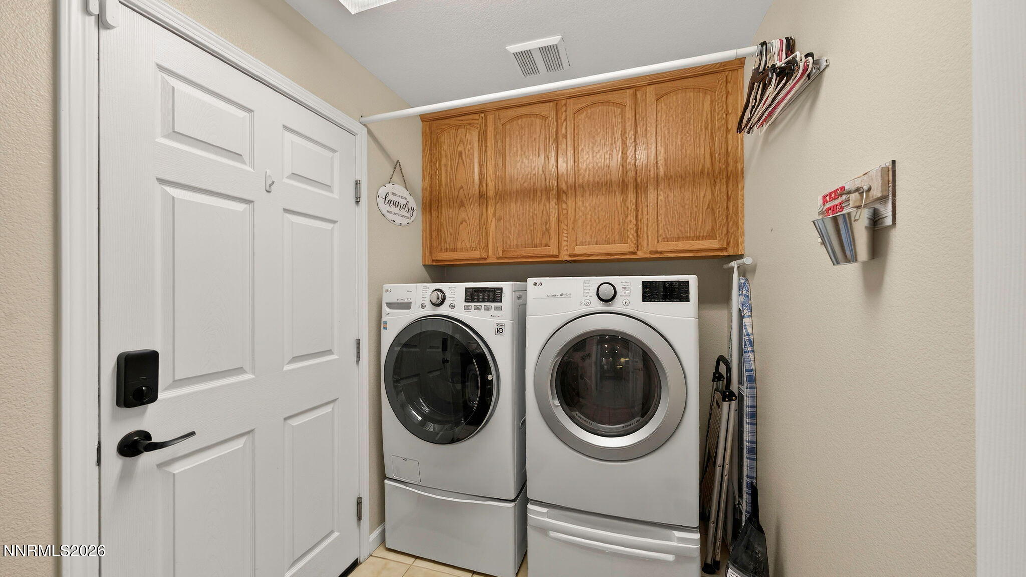 1750 Wind Ranch Road, Unit B Reno, NV 89521 - Photo 32 of 42 a utility room with dryer and washer