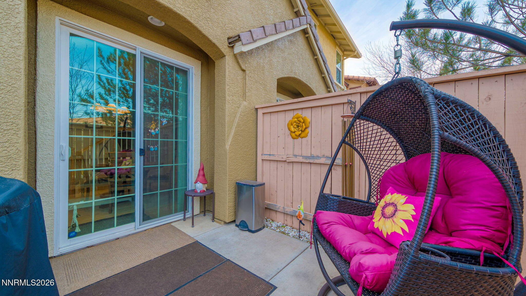 1750 Wind Ranch Road, Unit B Reno, NV 89521 - Photo 34 of 42 a view of a balcony with a couch