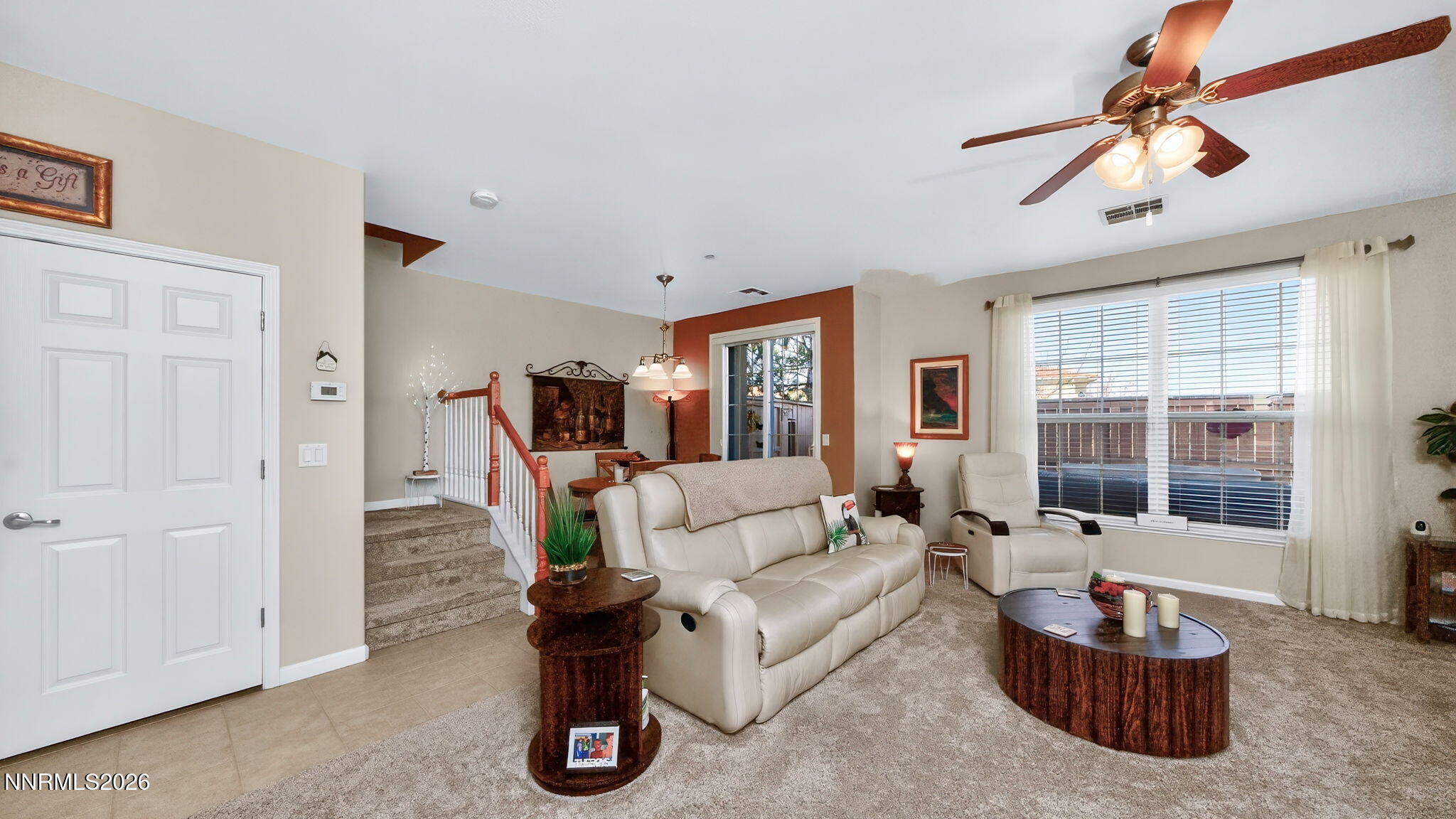 1750 Wind Ranch Road, Unit B Reno, NV 89521 - Photo 10 of 42 a living room with furniture and a window