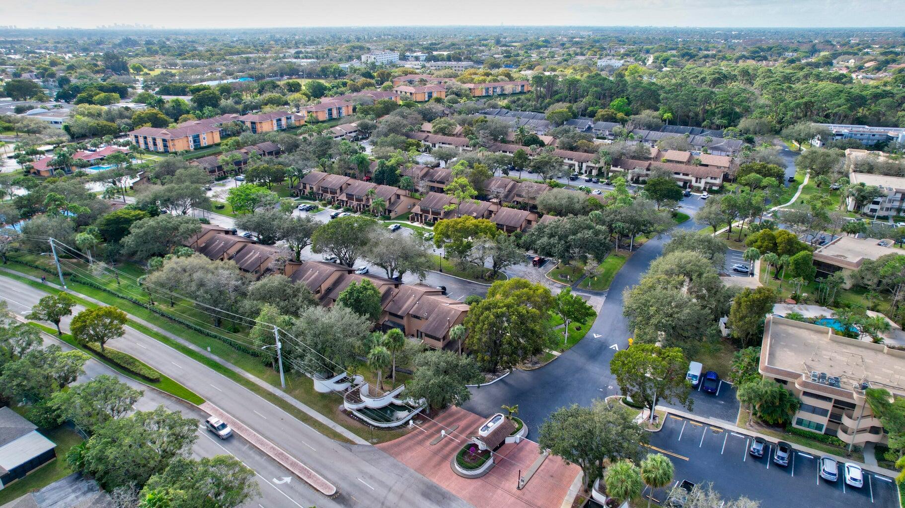 7610 Northwest 79th Avenue, Unit I5 Fort Lauderdale, FL 33321 - Photo 18 of 22 an aerial view of multiple house