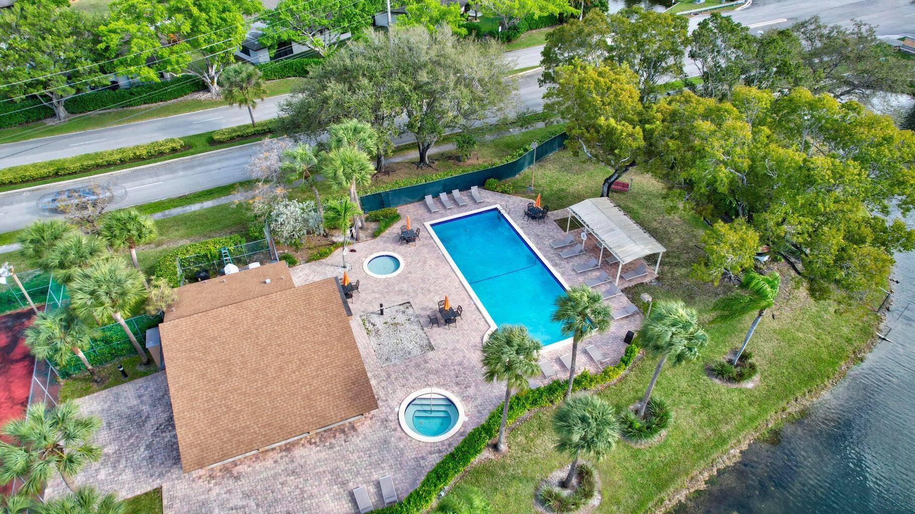 7610 Northwest 79th Avenue, Unit I5 Fort Lauderdale, FL 33321 - Photo 19 of 22 an aerial view of a house with a yard