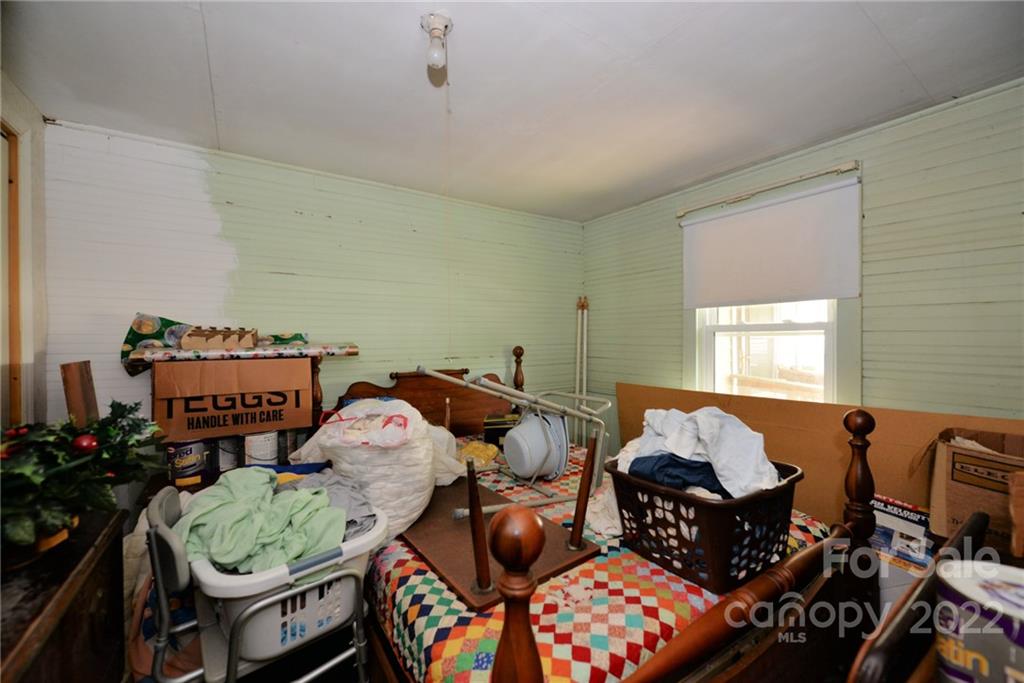 826 Monteith Branch Road Sylva, NC 28779 - Photo 10 of 14 a living room with furniture and a window