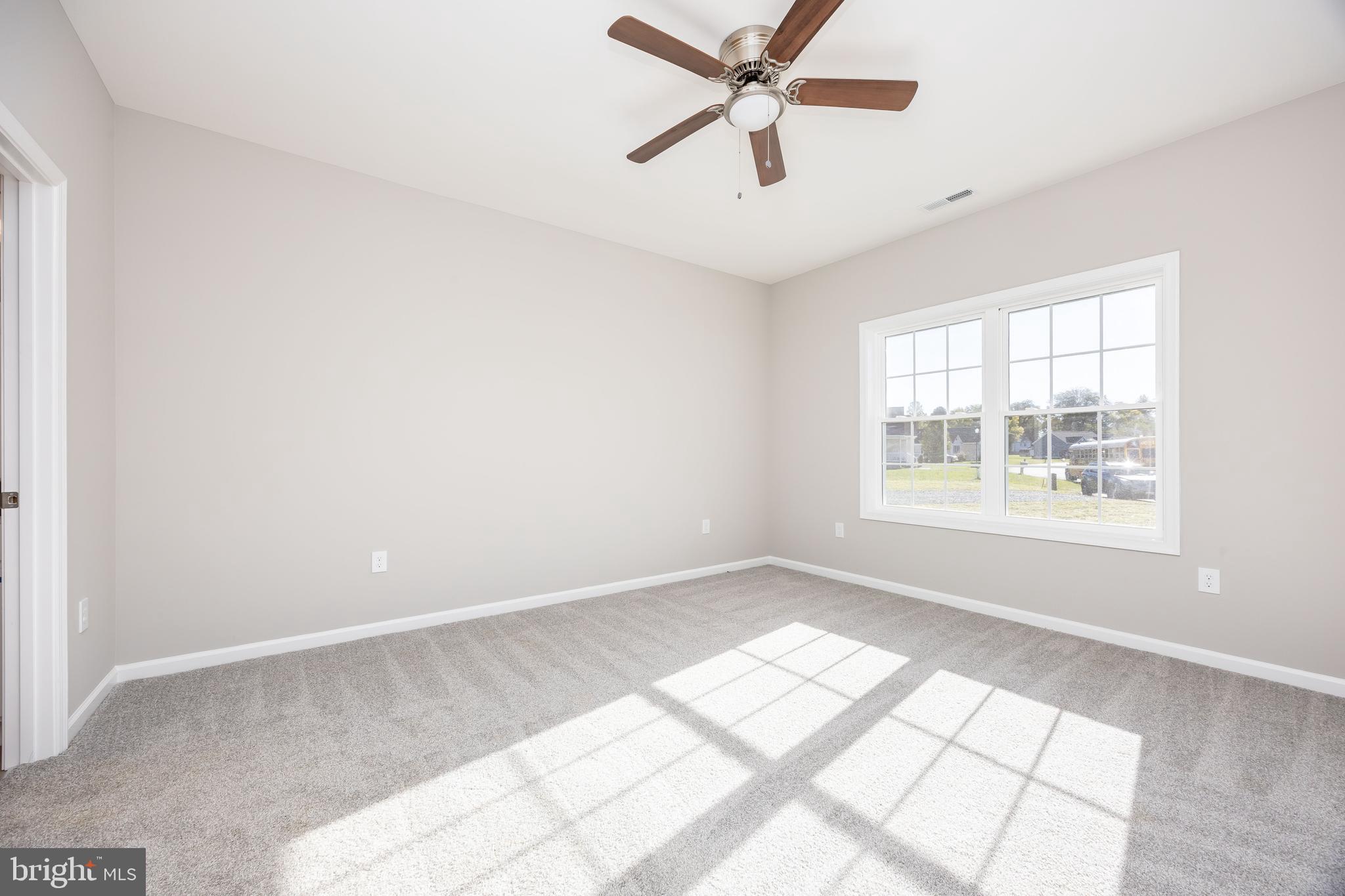 11779 St Stephens Way Princess Anne, MD 21853 - Photo 21 of 51 a view of an empty room with a window
