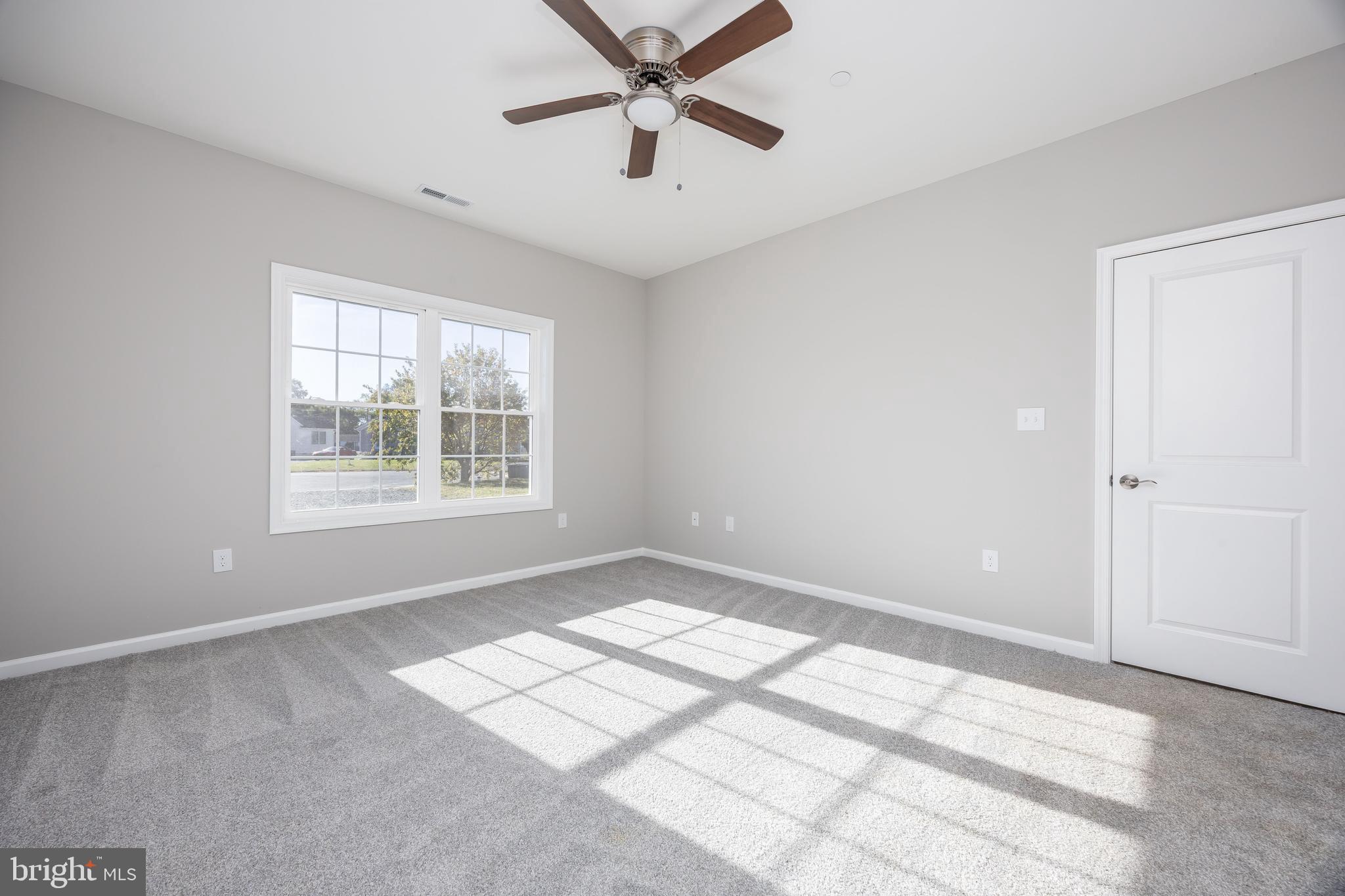 11779 St Stephens Way Princess Anne, MD 21853 - Photo 24 of 51 a view of an empty room with a window