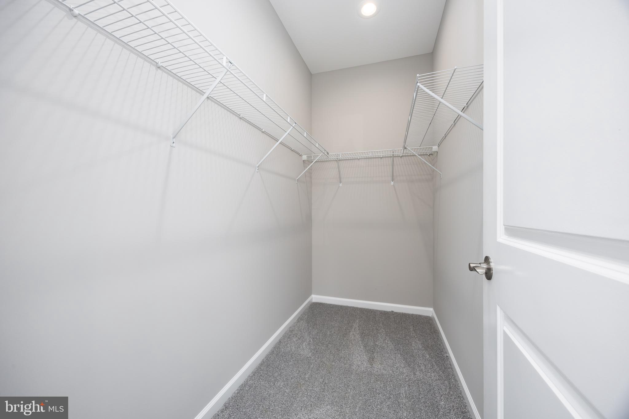 11779 St Stephens Way Princess Anne, MD 21853 - Photo 25 of 51 a view of a room with shelf