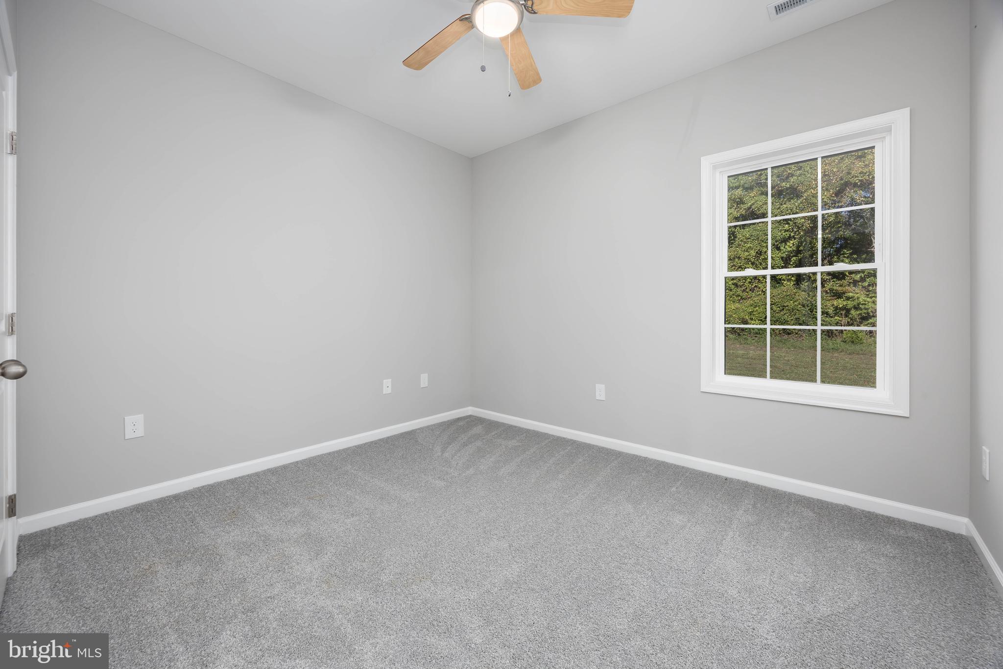 11779 St Stephens Way Princess Anne, MD 21853 - Photo 30 of 51 an empty room with a window